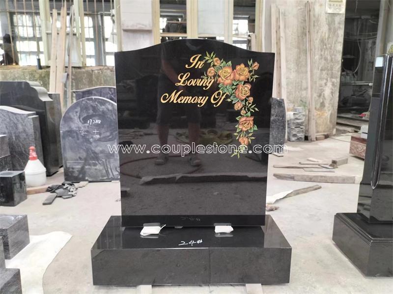 Headstone with flower carved painted gold color