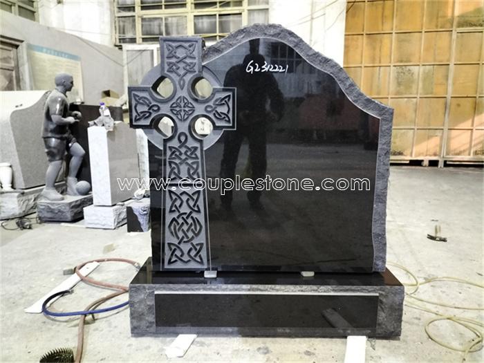 Black headstone with celtic cross design